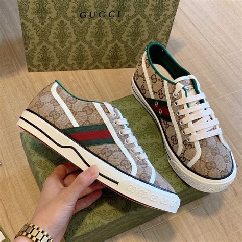 tenis gucci dorados|farfetch tenis de Gucci.